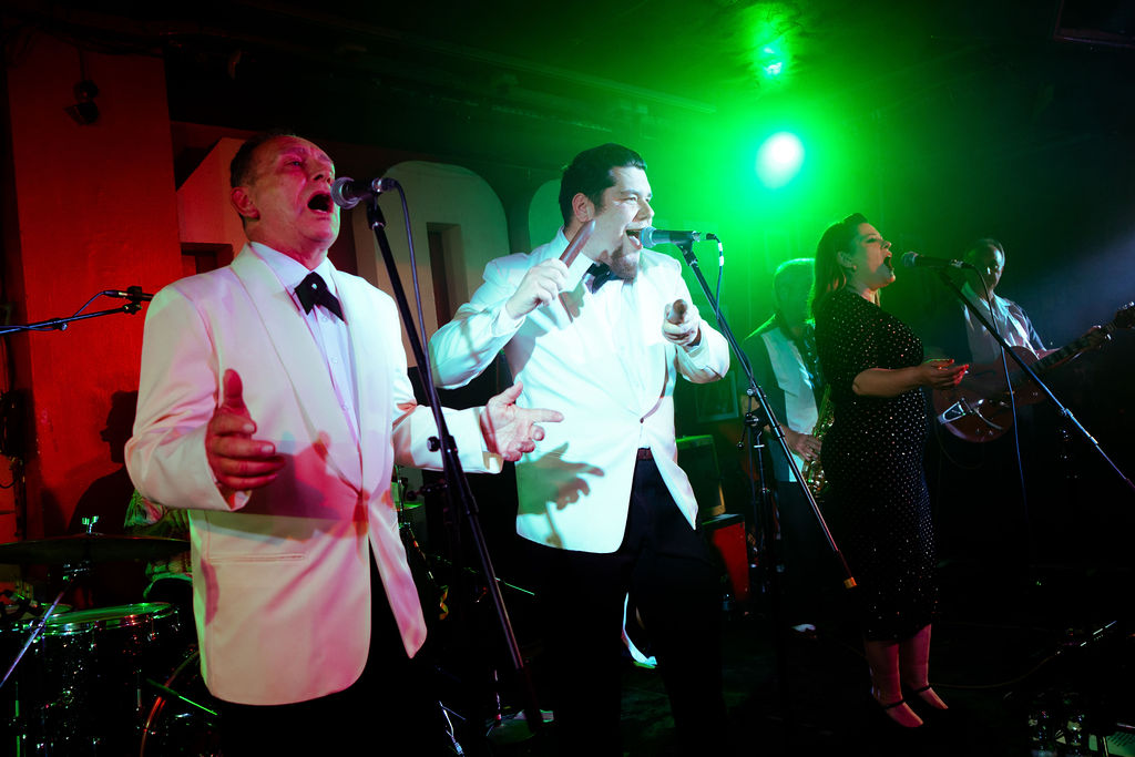 Doo Wop Explosion band performing live on stage UK