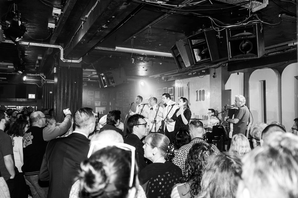 Doo Wop Explosion vocalist on stage live UK performance