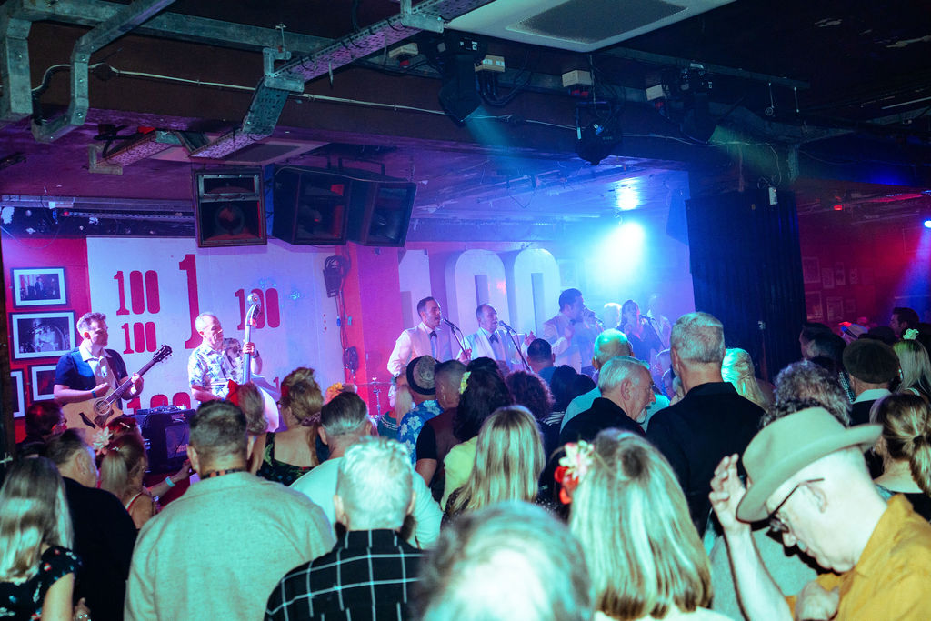 Doo Wop Explosion vocalist and band live UK stage performance